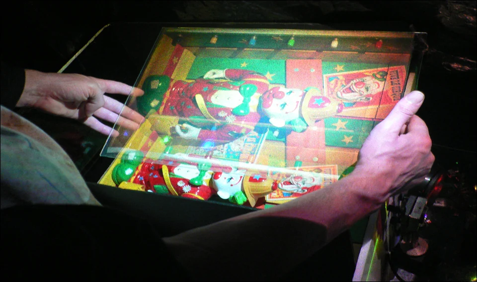 A photograph of Yves Gentet’s colour hologram, showing a luminous three-dimensional scene.
